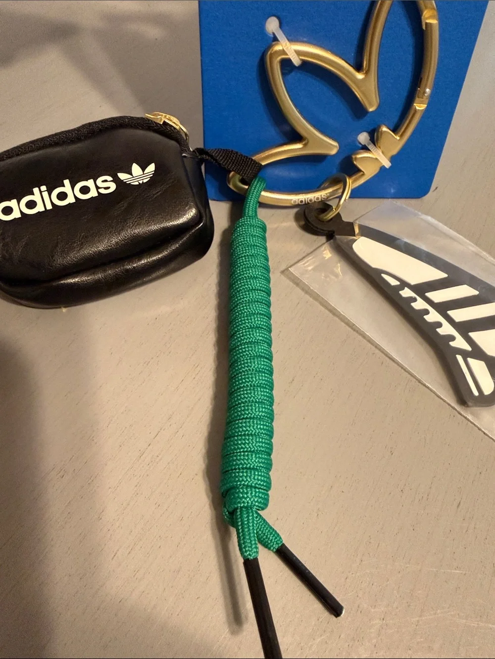 Adidas Black Mini Pouch Keychain with Gold Trefoil Charm and Green Lace - NEW